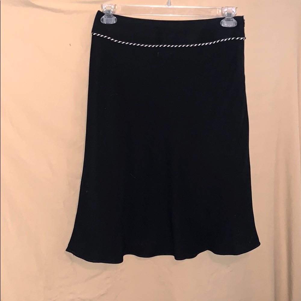 Women’s black skirt.